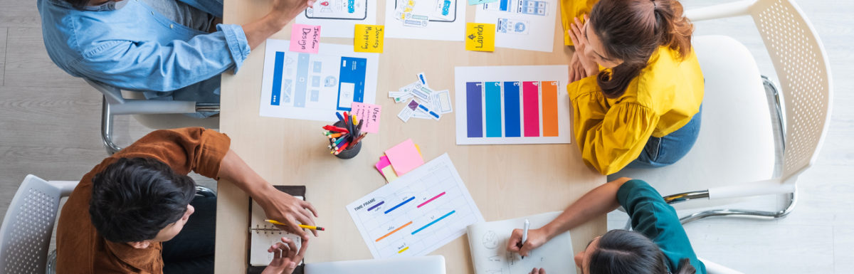 Diverse employees brainstorming in an office about creating and innovative culture